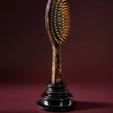 Oval Golden-Spike Hairbrush