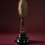 Oval Golden-Spike Hairbrush